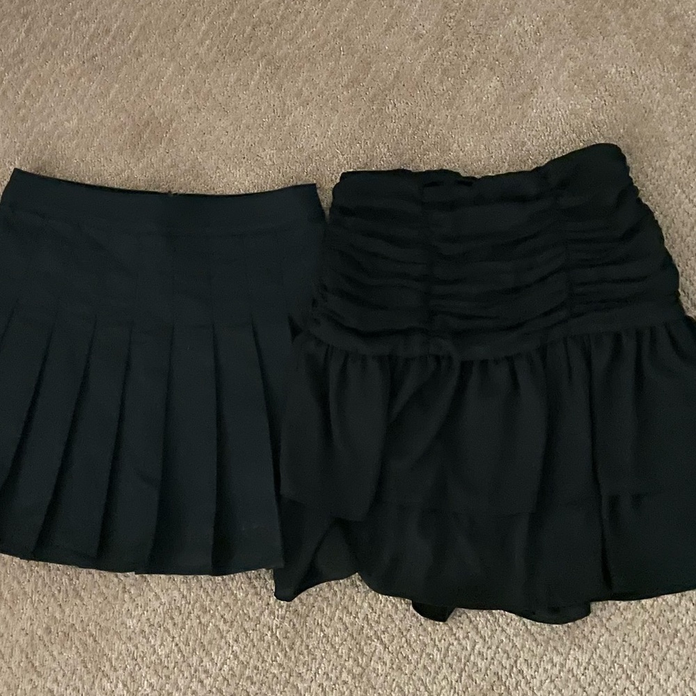2 black skirts
